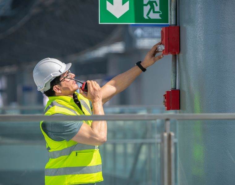 Fire Alarm Panel being inspected by HSI Security